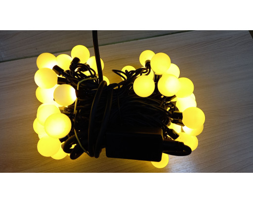 Гирлянда УЛИЧНАЯ Нить ШАРИКИ d=23mm, 70 LED, Теплый белый, постоянное свечение, черный провод, 7 метров